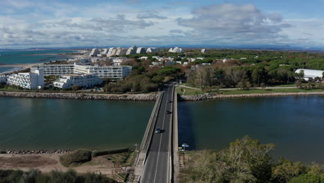 Bridge-with-la-Grande-Motte-in-background-aerial-view-France-mediterranean-sea